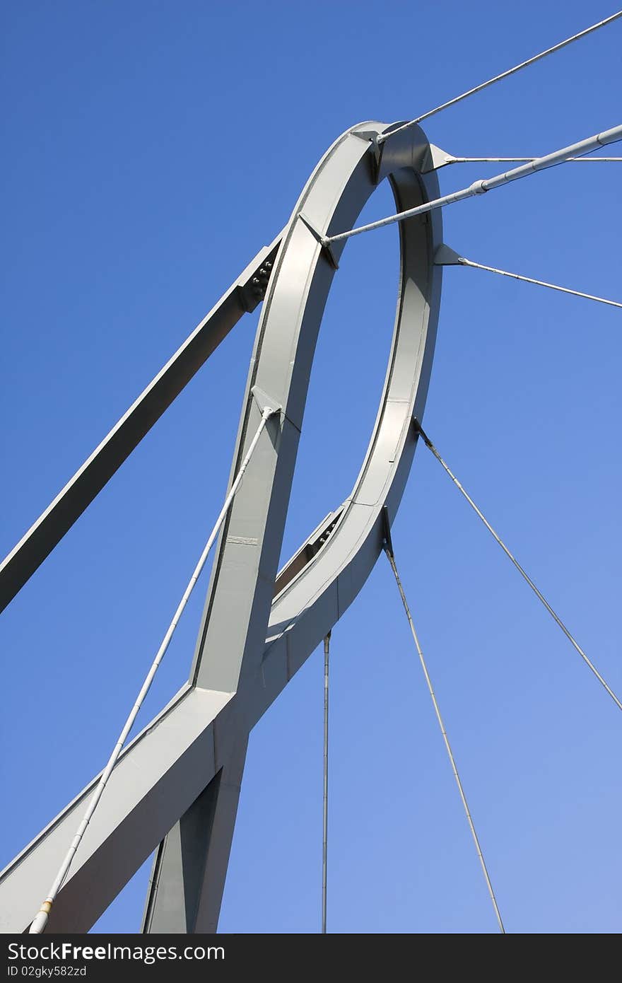 An abstract detail of a futuristic metal structure over a blue sky (abstract wallpaper). Aveiro, Portugal