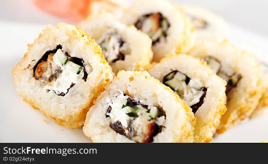 Unagi Fry Maki Sushi - Roll made of Smoked Eel, Cream Cheese and Cucumber. Unagi Fry Maki Sushi - Roll made of Smoked Eel, Cream Cheese and Cucumber