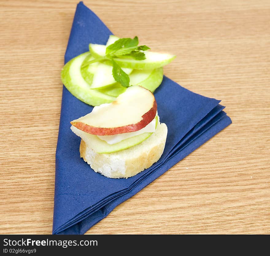 Fresh baguette with tasty brie cheese and organic fruits. Fresh baguette with tasty brie cheese and organic fruits