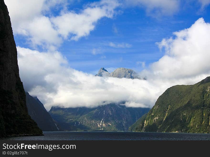 Broken clouds over Doubtful Sound, New Zealand South Island. Broken clouds over Doubtful Sound, New Zealand South Island.