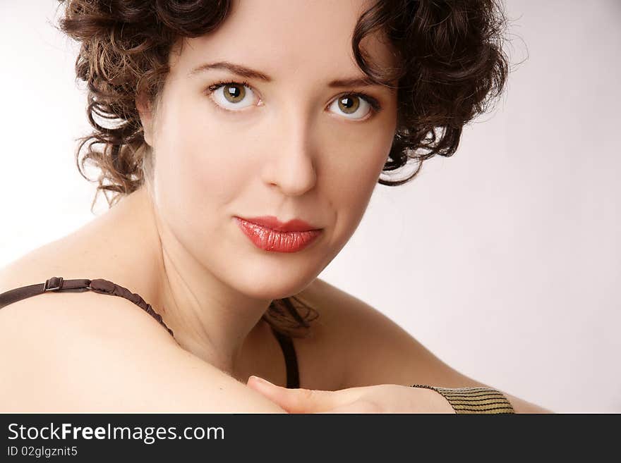 Portrait of beautiful young smiling woman, studio shot. Portrait of beautiful young smiling woman, studio shot