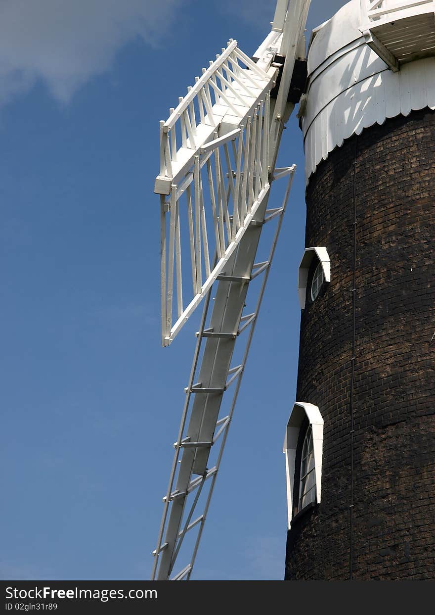 Windmill sails and side of building Surrey England. Windmill sails and side of building Surrey England