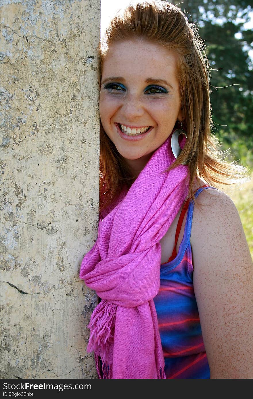 A portrait of a beautiful white, caucasian female teenager with a big smile on her face. A portrait of a beautiful white, caucasian female teenager with a big smile on her face