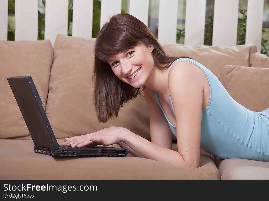 Woman With Laptop At Home