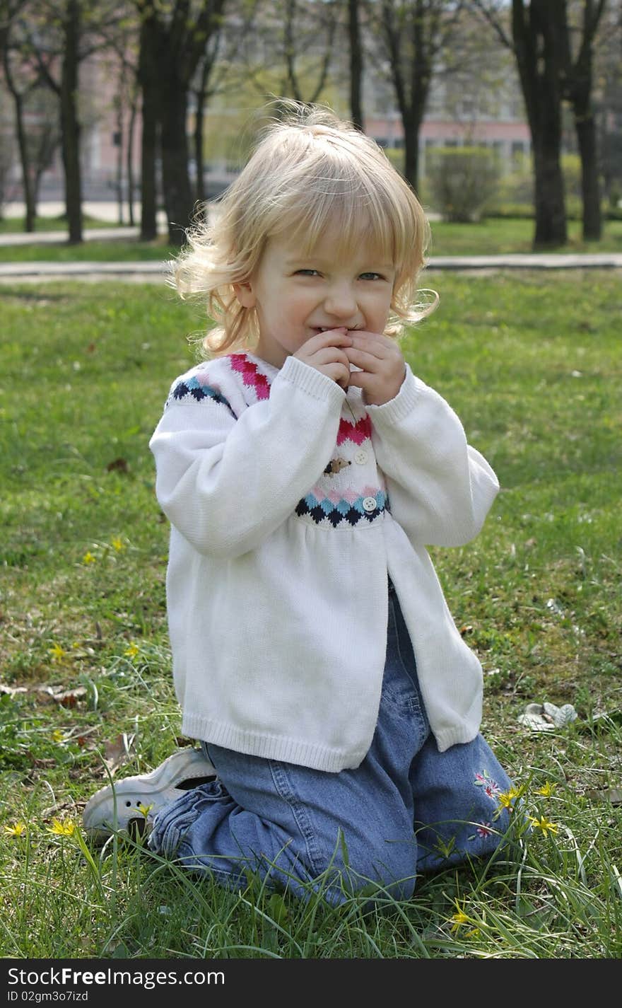 A little girl for a walk in the park