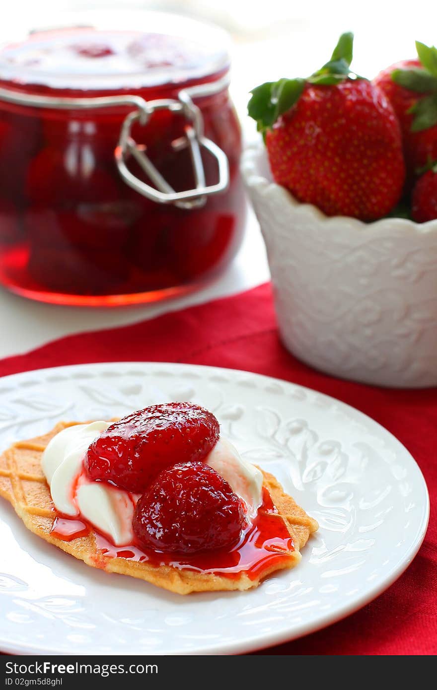 Waffles with strawberry jam