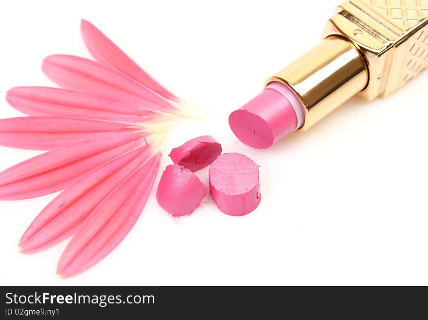 Pink lipstick on a white background