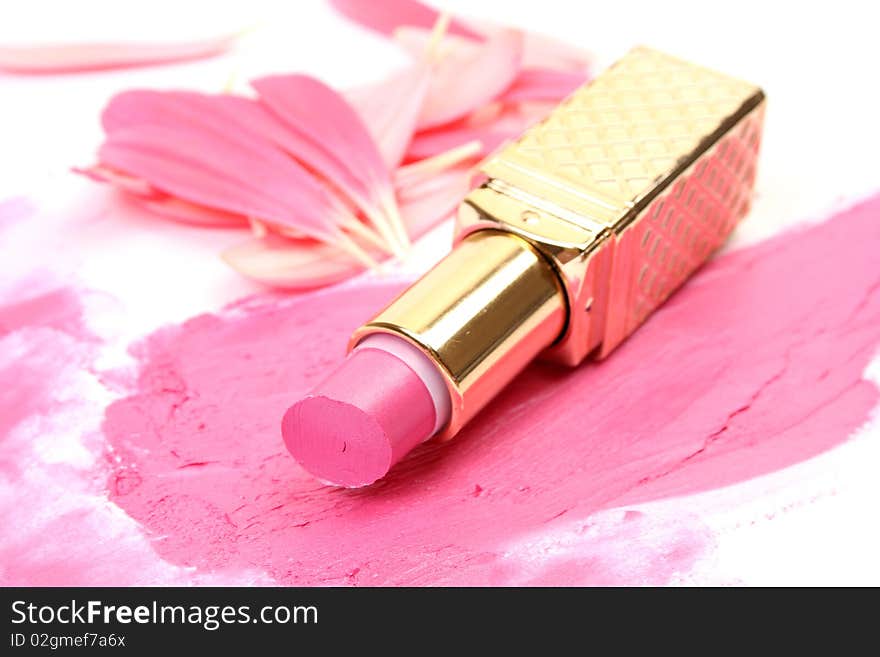 Pink lipstick on a white background