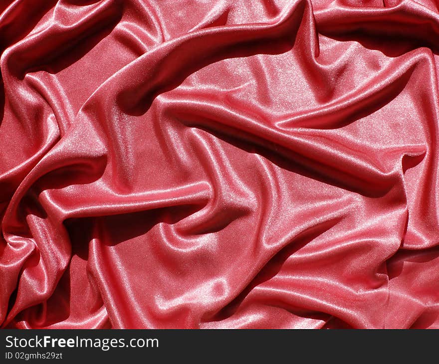 Red satin texture abstract background. Red satin texture abstract background