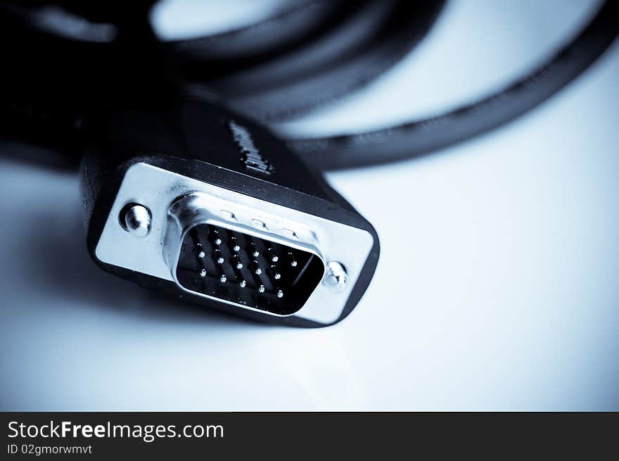 Close up and low level of the male connector of VGA cable arranged on a white background. Close up and low level of the male connector of VGA cable arranged on a white background