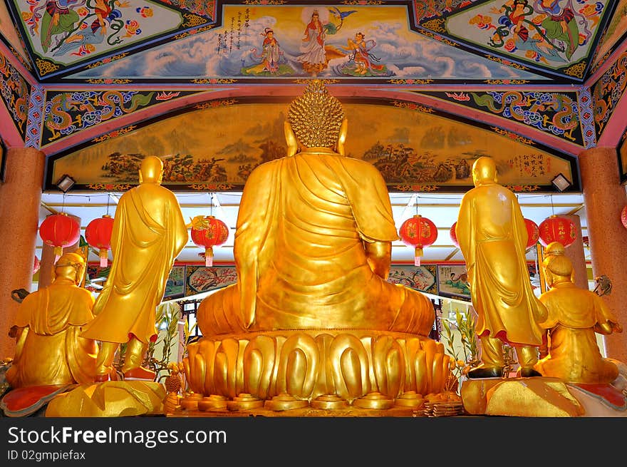 Back view of golden buddha statue