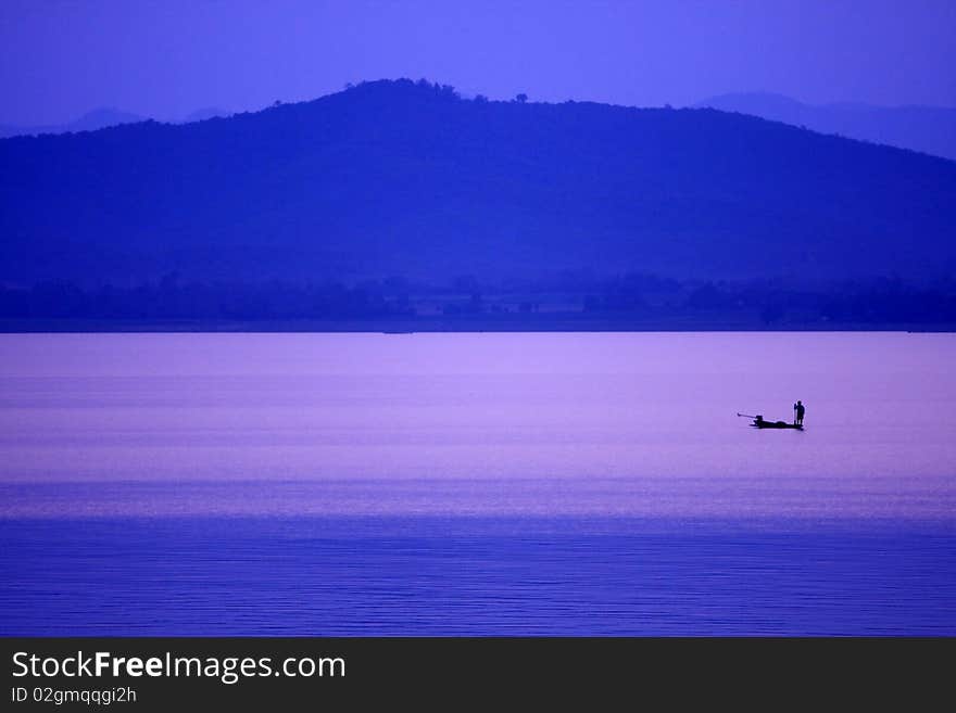 The fisherman in Kraseaw Dam,Thailand