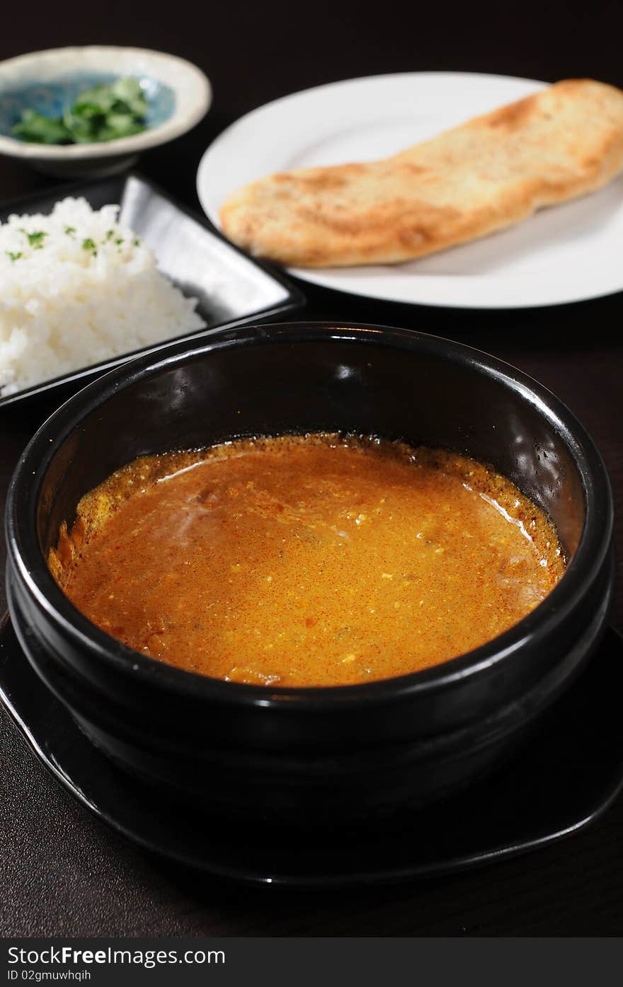 Hot soup on a black table