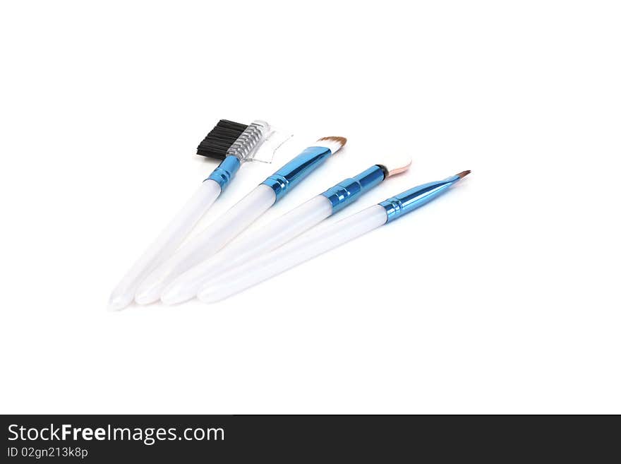 Brushes for cosmetics on a white background. Brushes for cosmetics on a white background