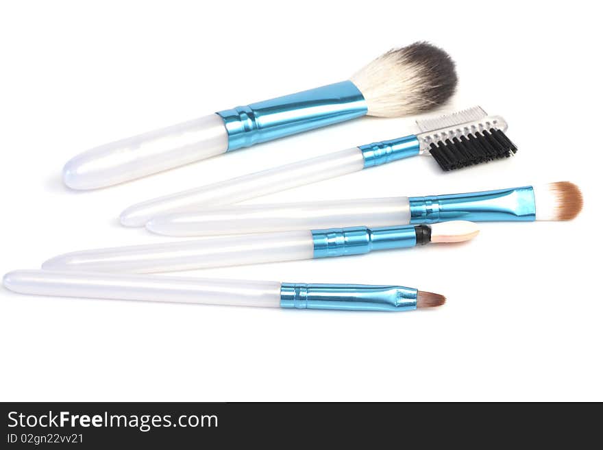 Brushes for cosmetics on a white background. Brushes for cosmetics on a white background