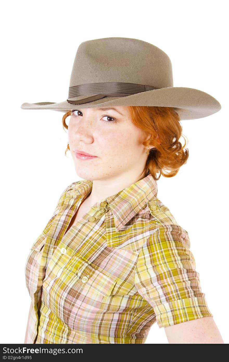 Girl in cowboy hat isolated on white