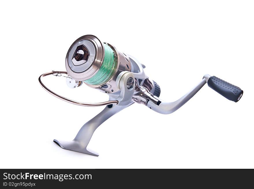 Steel fishing reel on white background isolated