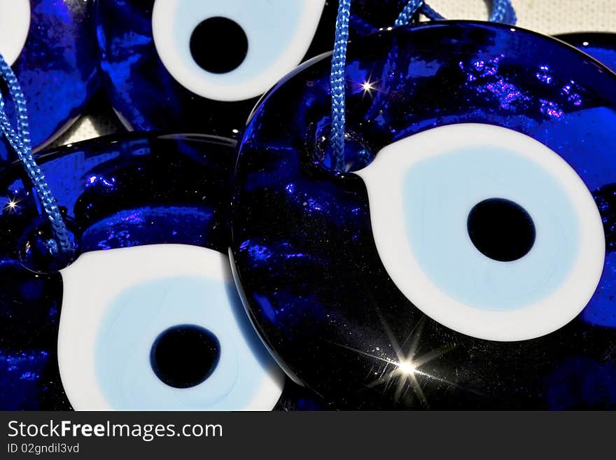 Bright blue evil eye souvenir jewelry from Turkey. Bright blue evil eye souvenir jewelry from Turkey