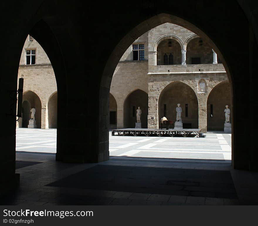 Court yard in the hospital of Knights fortress in Rhodes in Greece