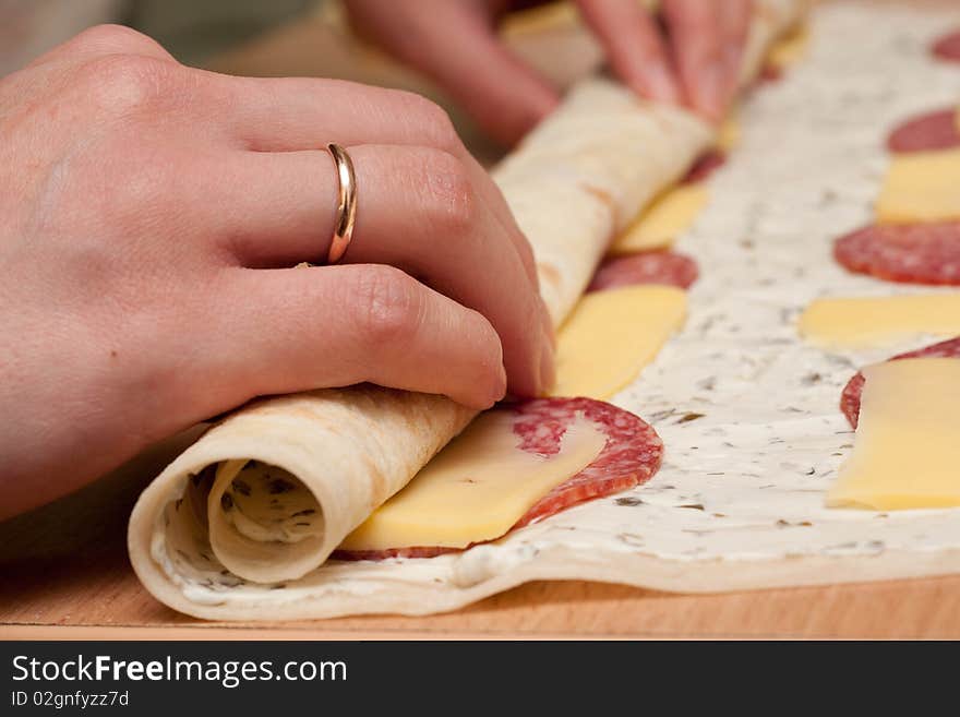 A process of preparing pizza. A process of preparing pizza