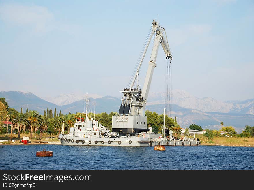 Tug boat and ships rane. Tug boat and ships rane