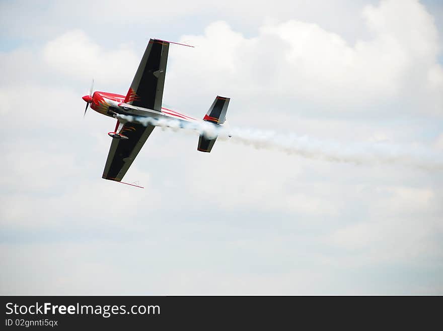 Airsow airplane on the sky with clouds