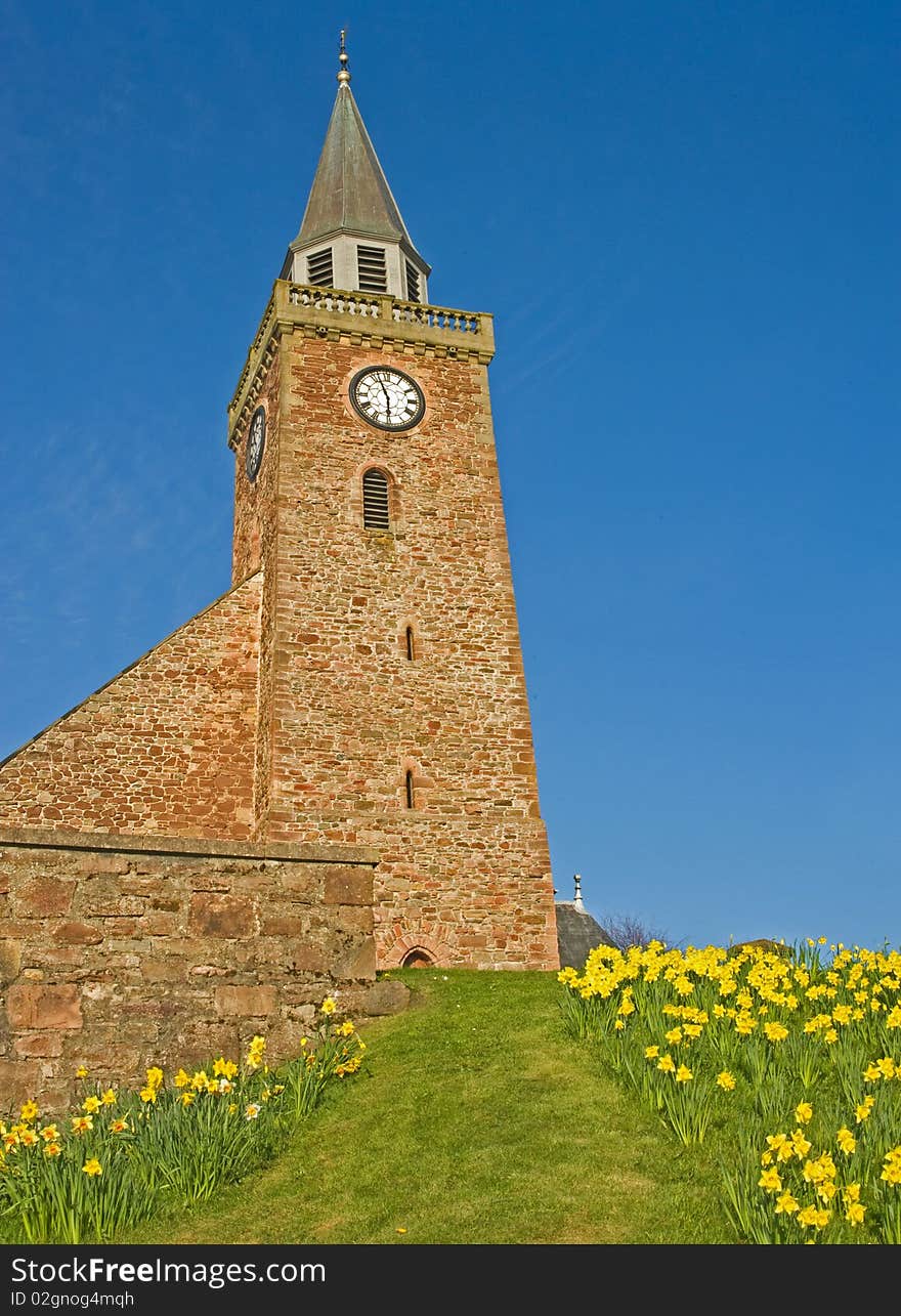 Path Through Daffodils To The Church.