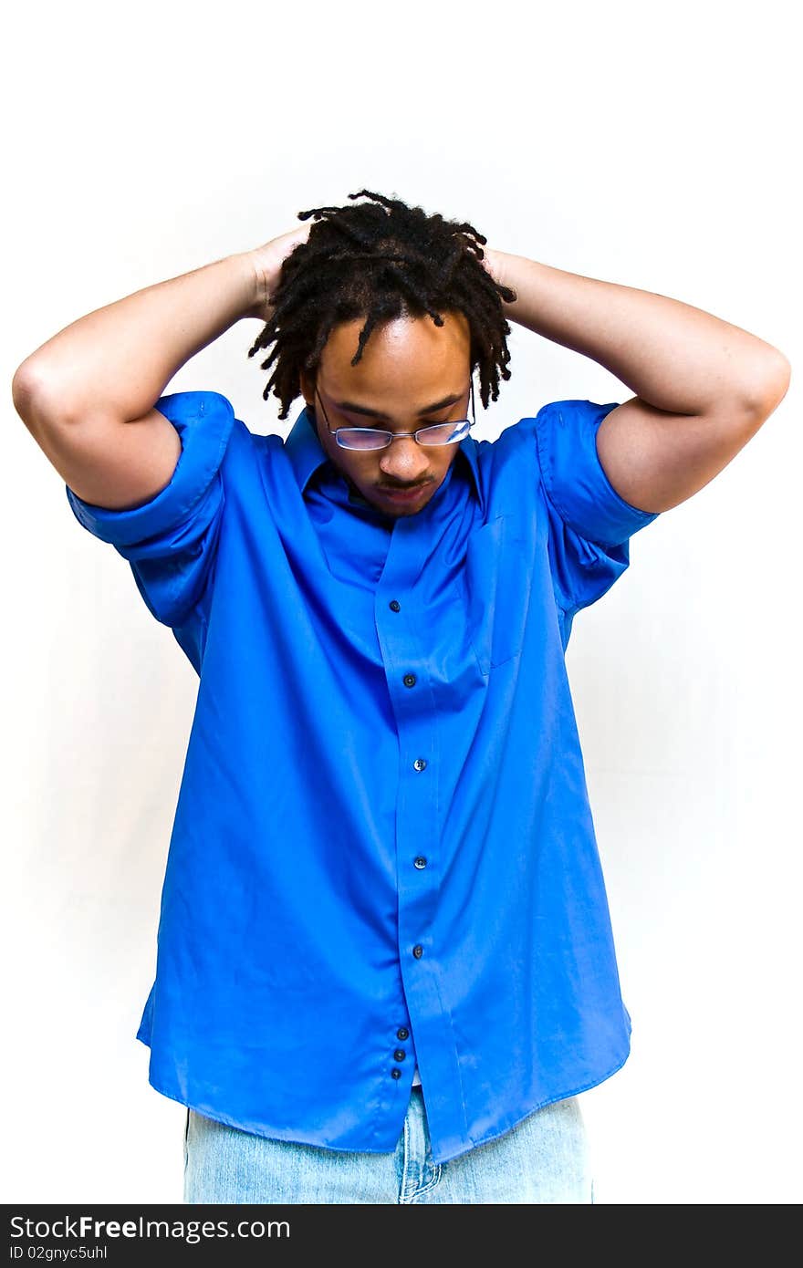 Middle to upper twenty year old adult male model posing on a white background. Middle to upper twenty year old adult male model posing on a white background.