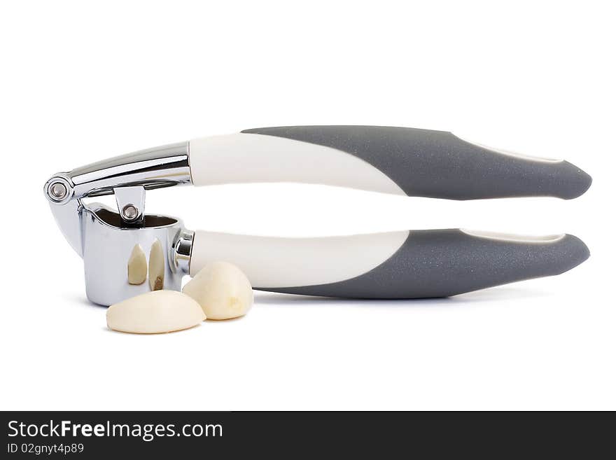 Garlic press isolated on white