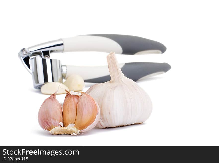 Garlic press isolated on white