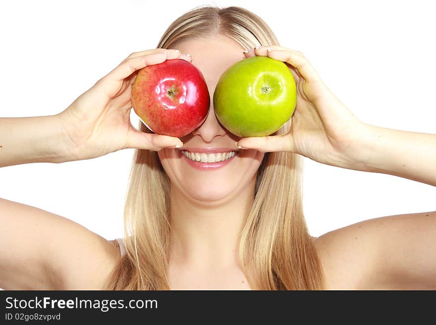 Caucasian blond woman with apples on isolated background