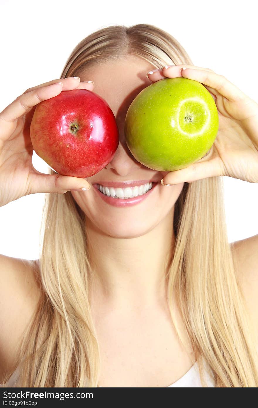 Caucasian blond woman with apples on isolated background