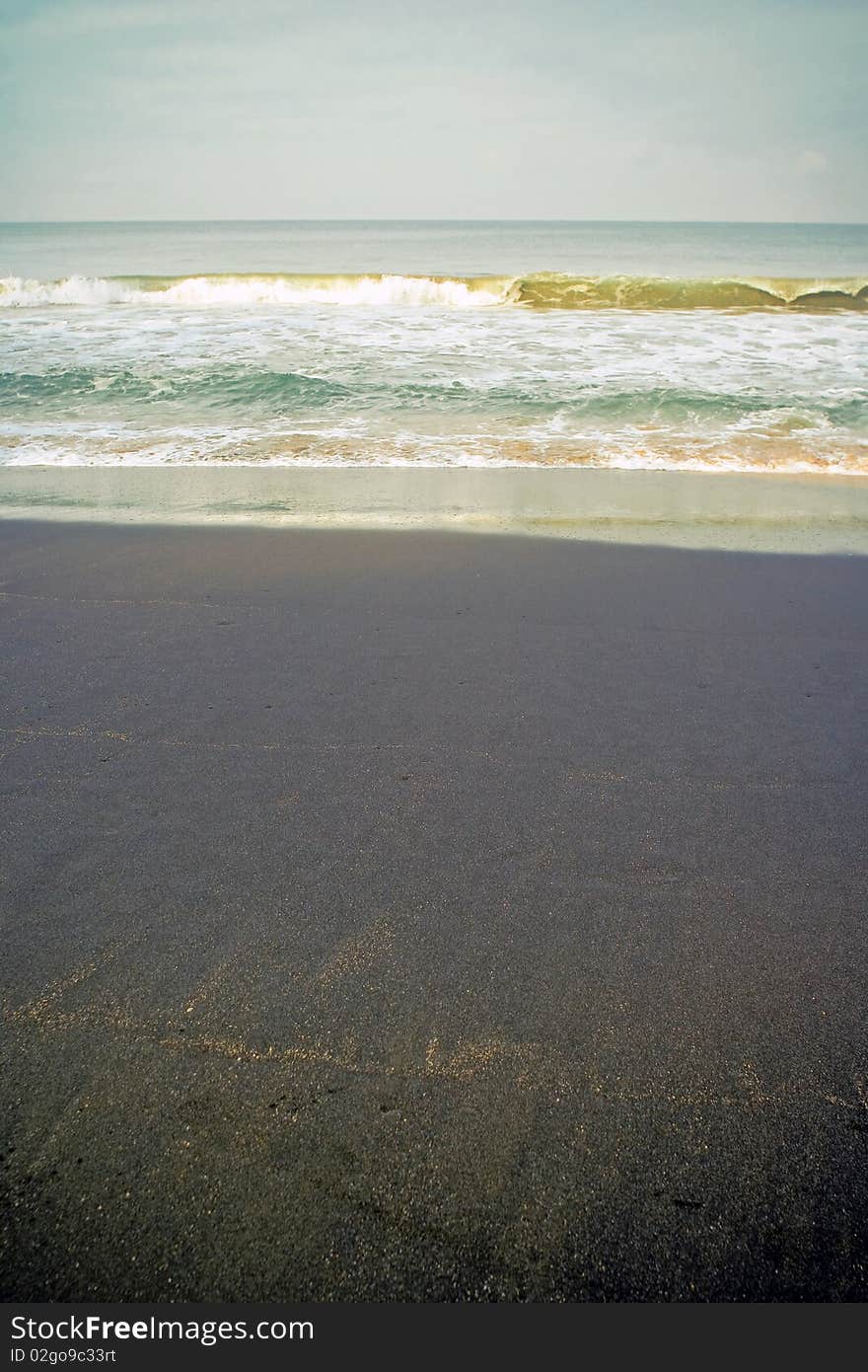 Seaside with black sand.