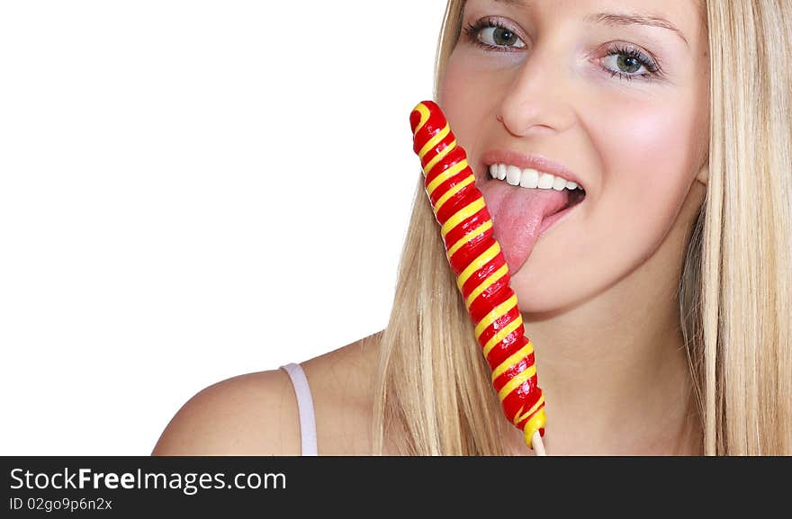 Caucasian blond woman licking lolipop. Caucasian blond woman licking lolipop