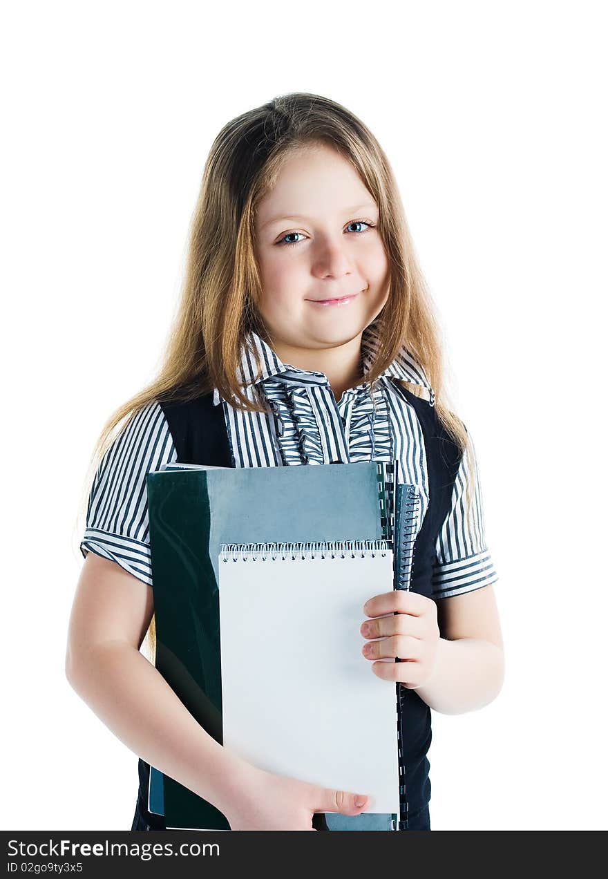 Cute schoolchild with notebooks on white background