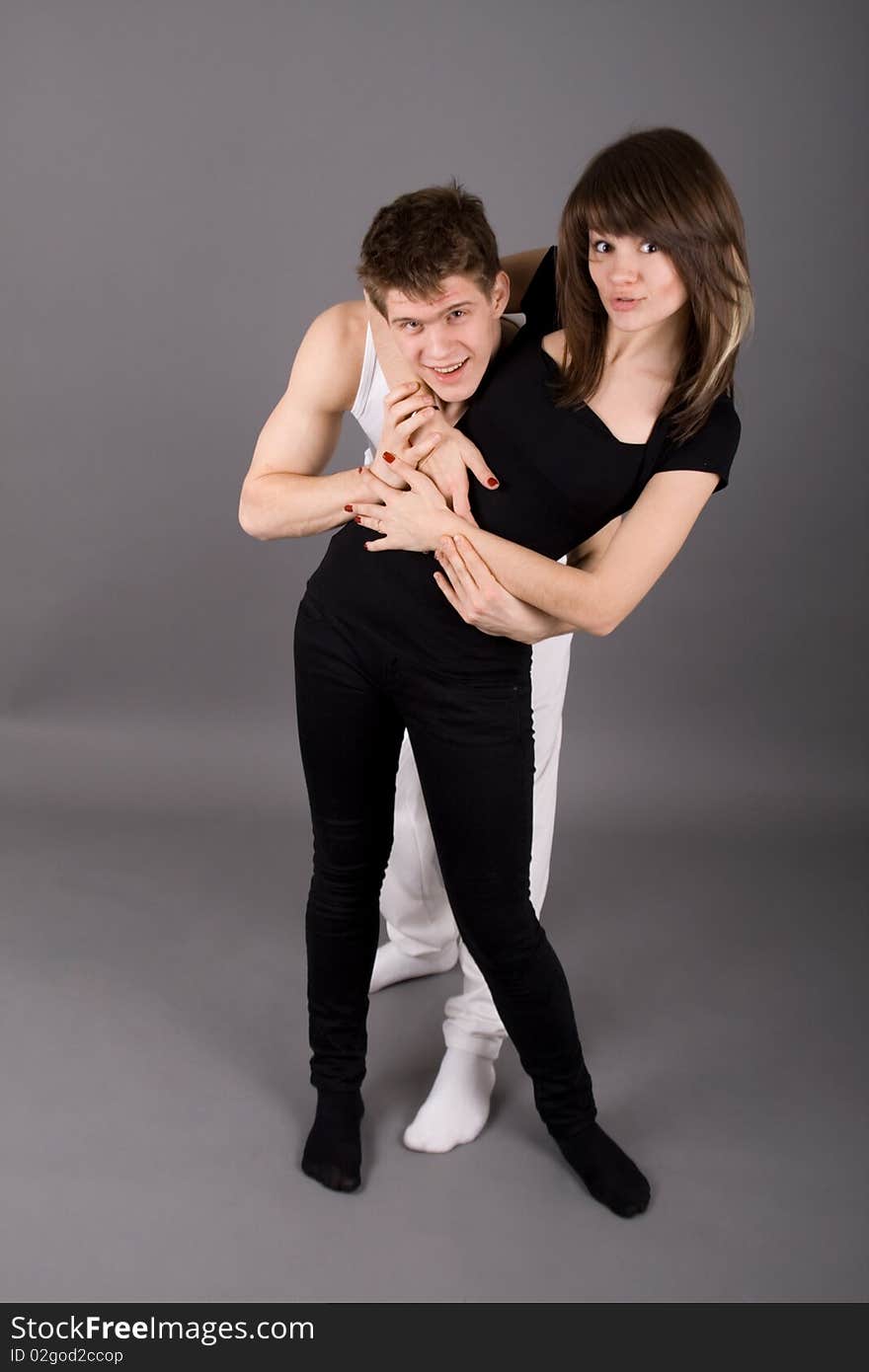 Dancing couple in a studio