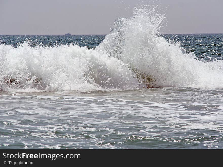 Sea Wave. Ship On Background.