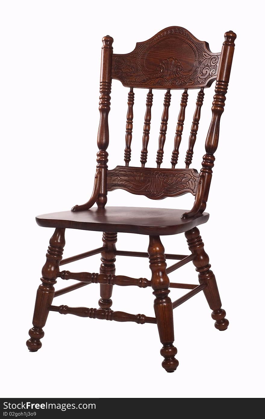 Old wooden carved heavy chair. Old wooden carved heavy chair