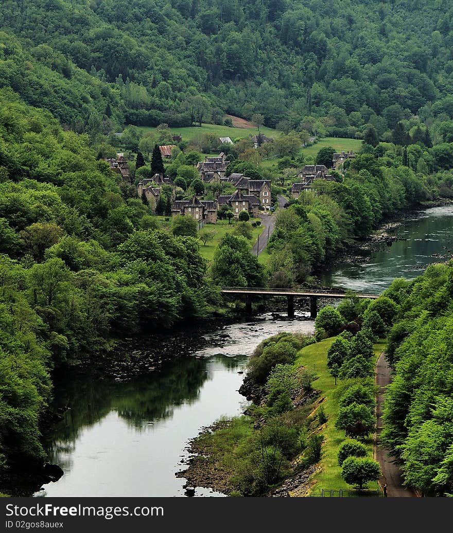 A village in a valley as seen from Barrage L'agile near correze france. A village in a valley as seen from Barrage L'agile near correze france