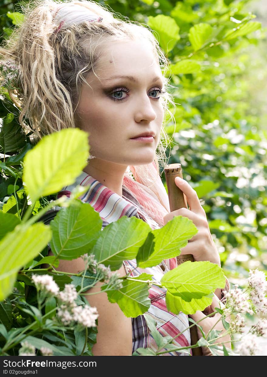 Beautiful young girl resting outdoors. Beautiful young girl resting outdoors