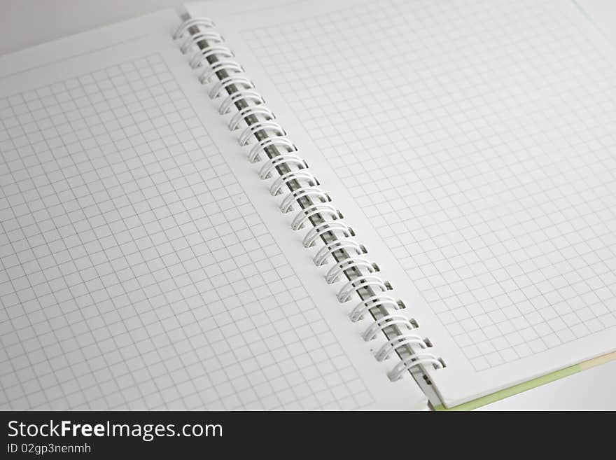 Open notebook with a spiral, a diagonal arrangement. Open notebook with a spiral, a diagonal arrangement