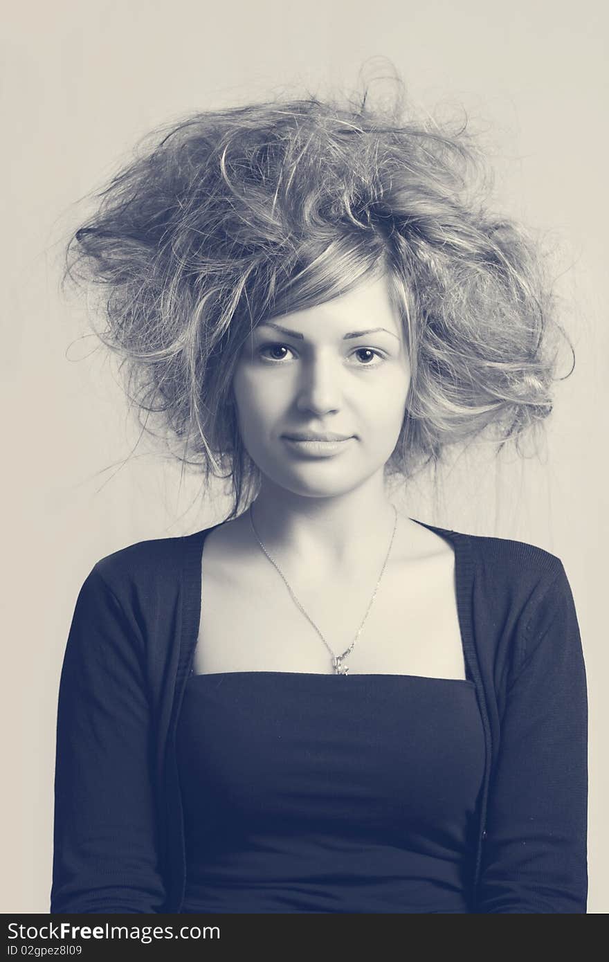 Vintage portrait of a beautiful woman with strange hairstyle. Vintage portrait of a beautiful woman with strange hairstyle