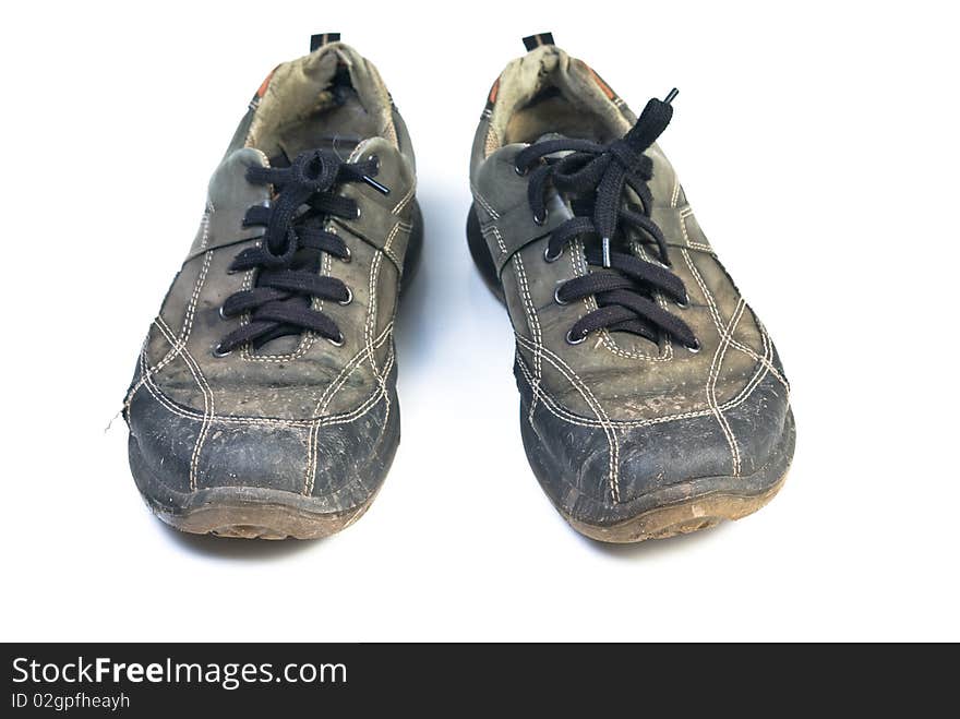 Old sports shoes. Isolated on white background.