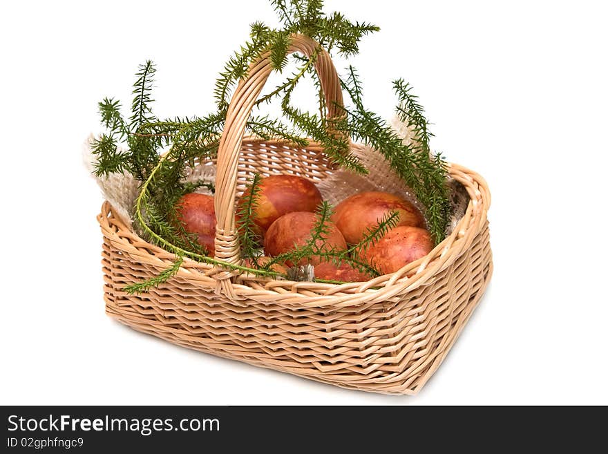 Easter eggs in Easter basket on white background. Easter eggs in Easter basket on white background