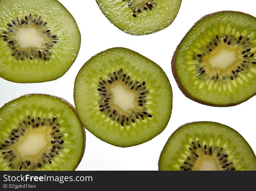 Kiwi slices on a white background. Kiwi slices on a white background