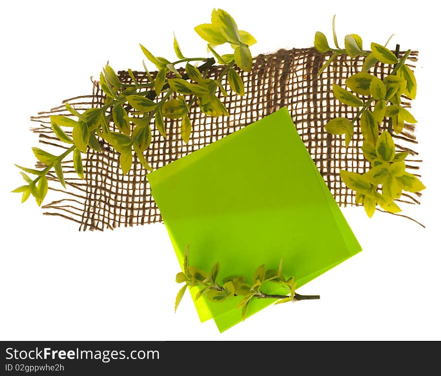 Stickers with leafs and sackcloth with copy space isolated on white