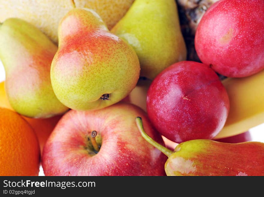 Heap of ripe tasty fruit close up