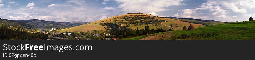 Village in mountains panorama