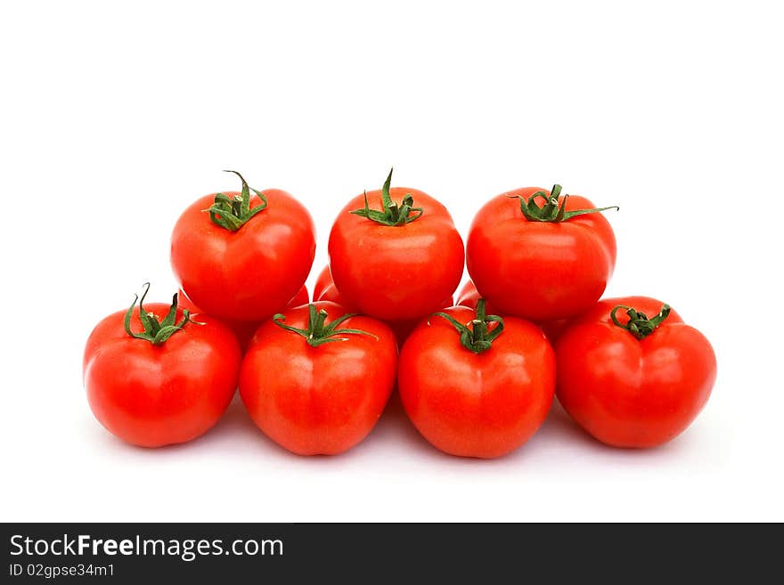 A few red tomatoes isolated on white