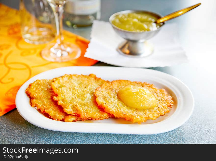 Bavarian food from potatoes on the restaurant table. Bavarian food from potatoes on the restaurant table